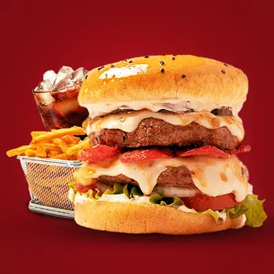 a burger wth fries and cold drinks